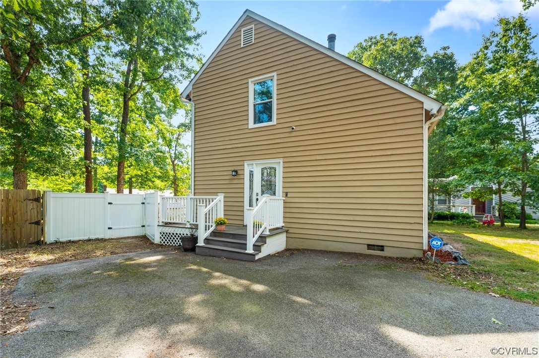 10706 Genlou Road Chesterfield, VA 23832 - Photo 4 of 34 a view of a house with backyard