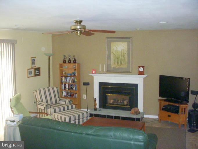 14945 Wellwood Road Silver Spring, MD 20905 - Photo 13 of 30 GAS FIREPLACE, CEILING FAN, NEW SLIDER TO PATIO!