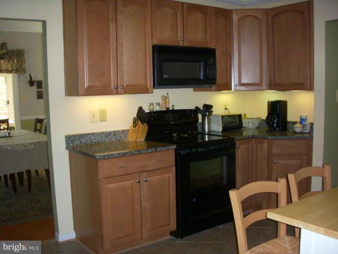 14945 Wellwood Road Silver Spring, MD 20905 - Photo 21 of 30 STRIKING BLACK APPLIANCES