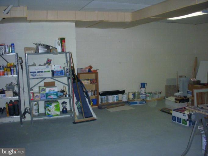14945 Wellwood Road Silver Spring, MD 20905 - Photo 26 of 30 UNFINISHED FOR PLENTY OF STORAGE OR PLAYROOM