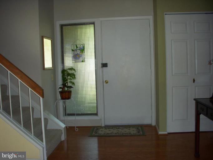 14945 Wellwood Road Silver Spring, MD 20905 - Photo 8 of 30 MORE FOYER, COAT CLOSET, NEW INTERIOR DOORS