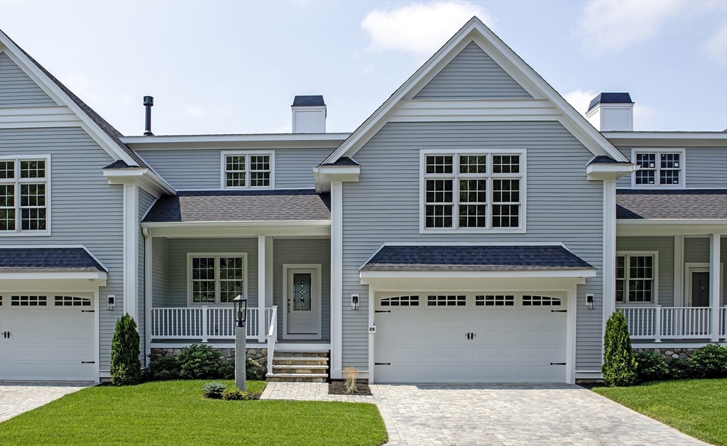 25 Clubview Drive, Unit 25 Andover, MA 01810 - Photo 1 of 19 front view of a house with a yard
