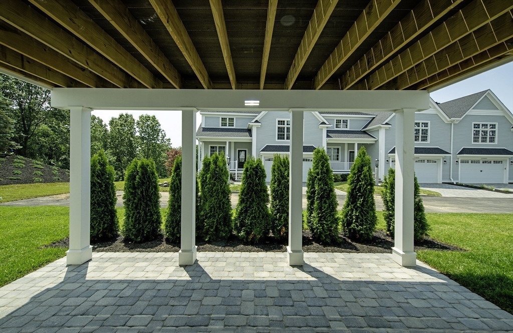 25 Clubview Drive, Unit 25 Andover, MA 01810 - Photo 19 of 19 a building view with a garden space