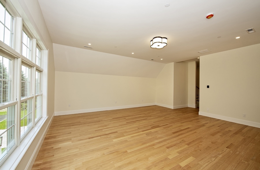 25 Clubview Drive, Unit 25 Andover, MA 01810 - Photo 7 of 19 a view of an empty room with a window