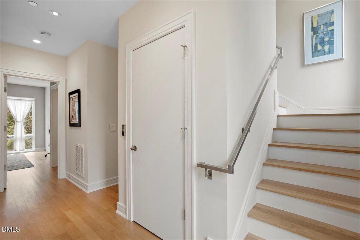 206 Dundas Lane Raleigh, NC 27603 - Photo 15 of 30 a view of a hallway with wooden floor and entryway