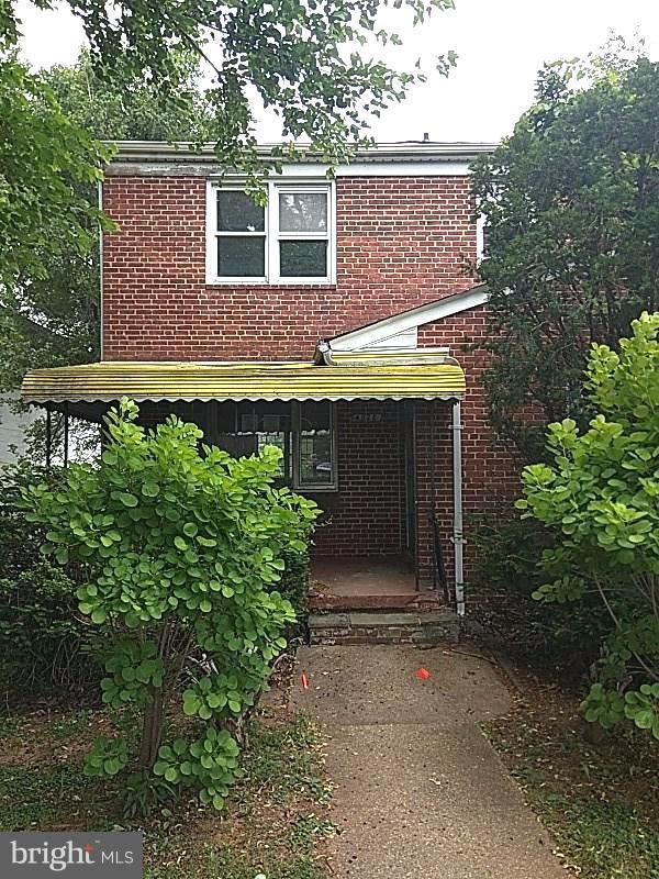 4028 Fallstaff Road Baltimore, MD 21215 - Photo 1 of 28 front view of a house with a yard