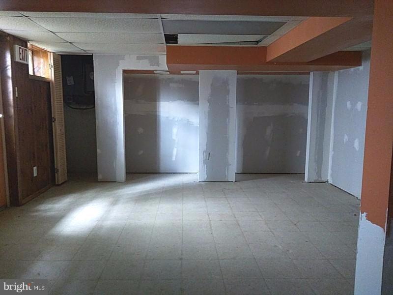 4028 Fallstaff Road Baltimore, MD 21215 - Photo 14 of 28 a view of empty room with windows