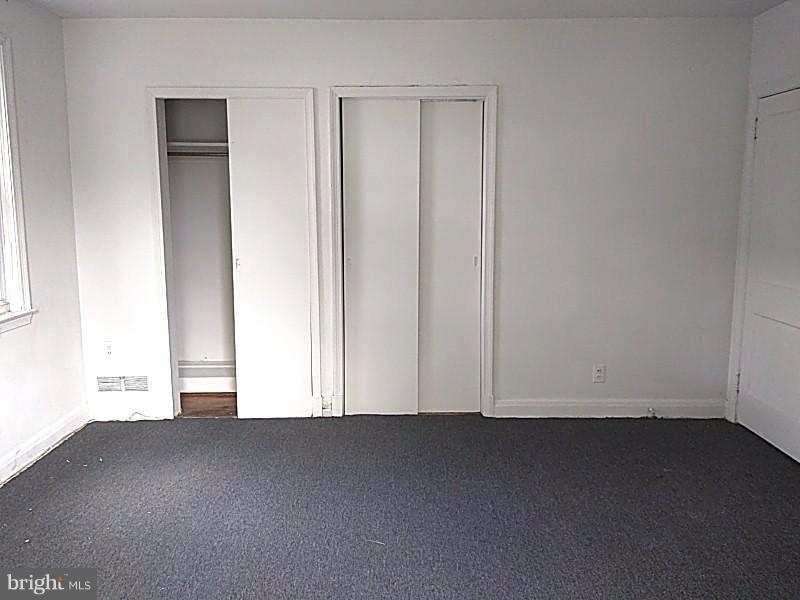 4028 Fallstaff Road Baltimore, MD 21215 - Photo 19 of 28 an empty room with closet