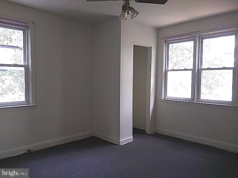 4028 Fallstaff Road Baltimore, MD 21215 - Photo 22 of 28 an empty room with a window
