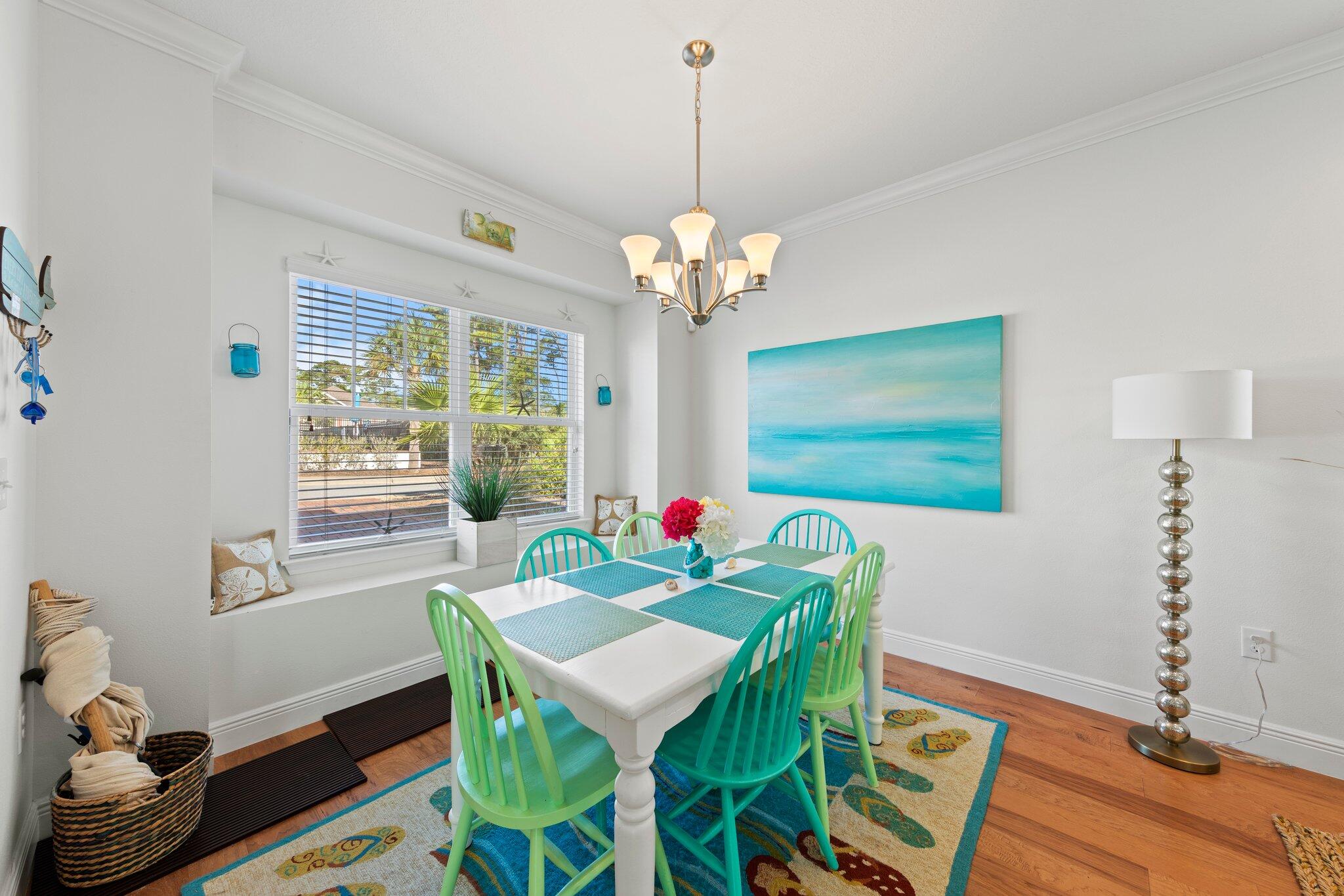 174 Sandpine Loop Inlet Beach, FL 32461 - Photo 11 of 45 a view of a dining room with furniture window and wooden floor