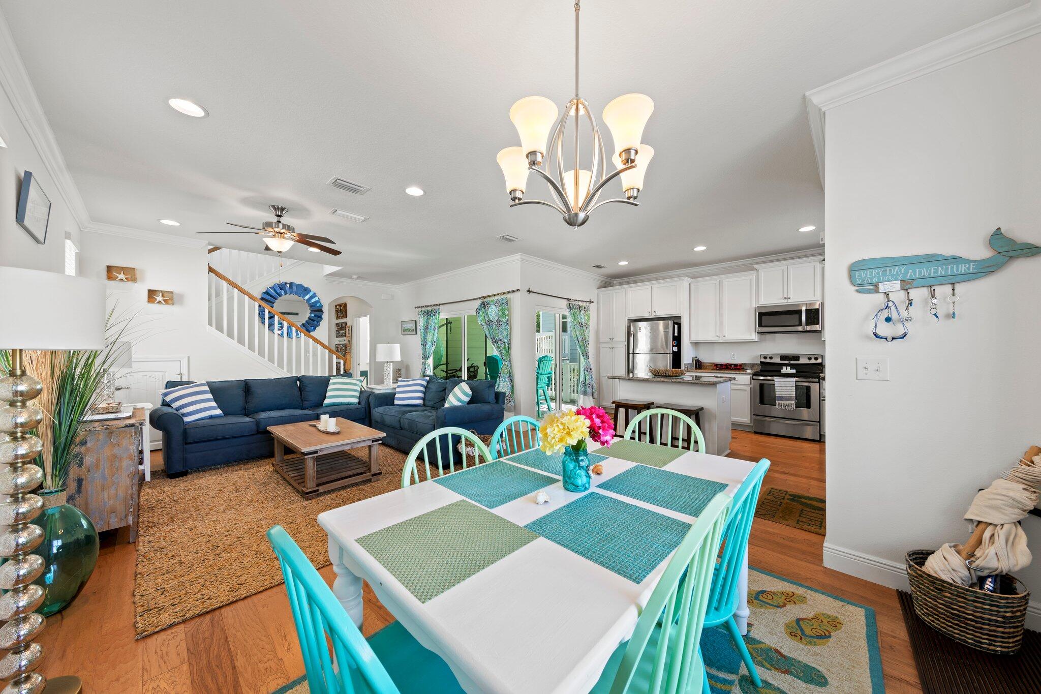 174 Sandpine Loop Inlet Beach, FL 32461 - Photo 13 of 45 a living room with kitchen island furniture and a chandelier