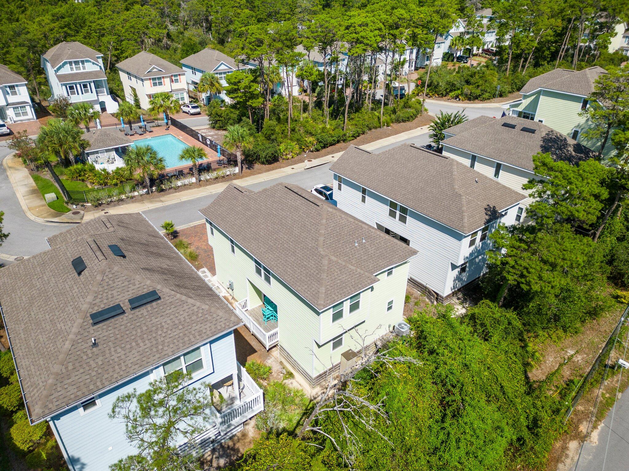174 Sandpine Loop Inlet Beach, FL 32461 - Photo 3 of 45 an aerial view of a house with a garden