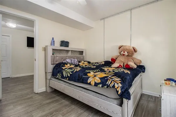 a bed room with a bed and a tv