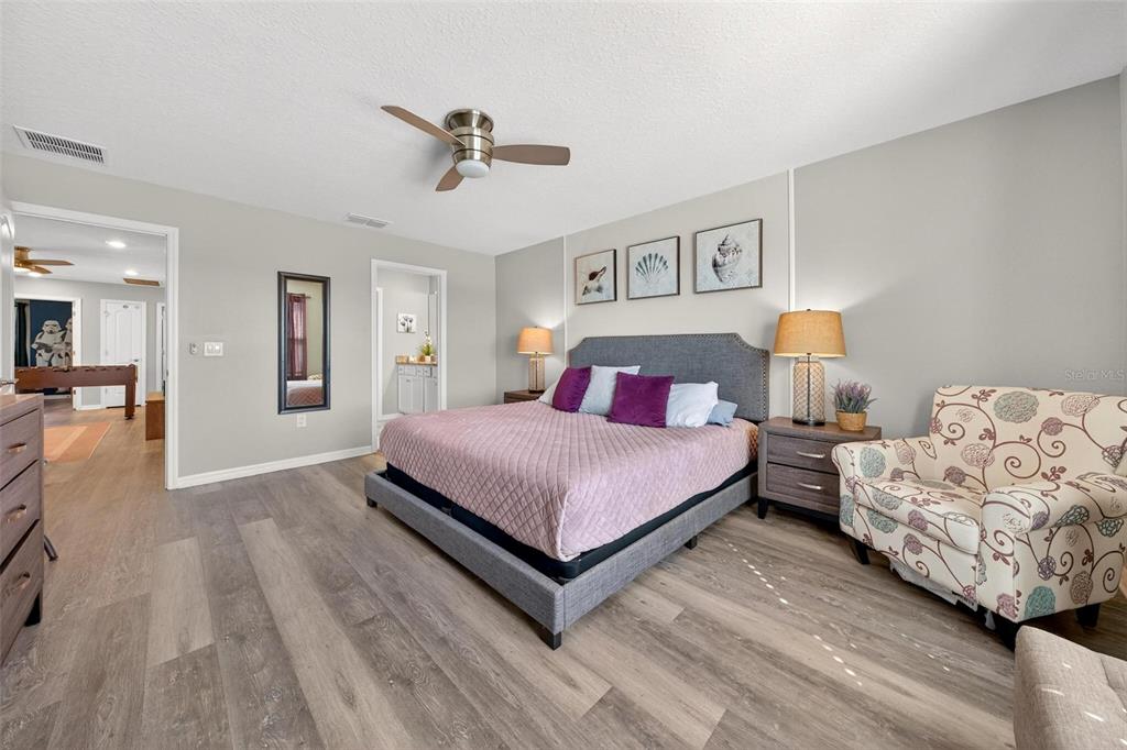 7554 Oak Spring Lane Davenport, FL 33837 - Photo 34 of 74 a bedroom with a bed and window