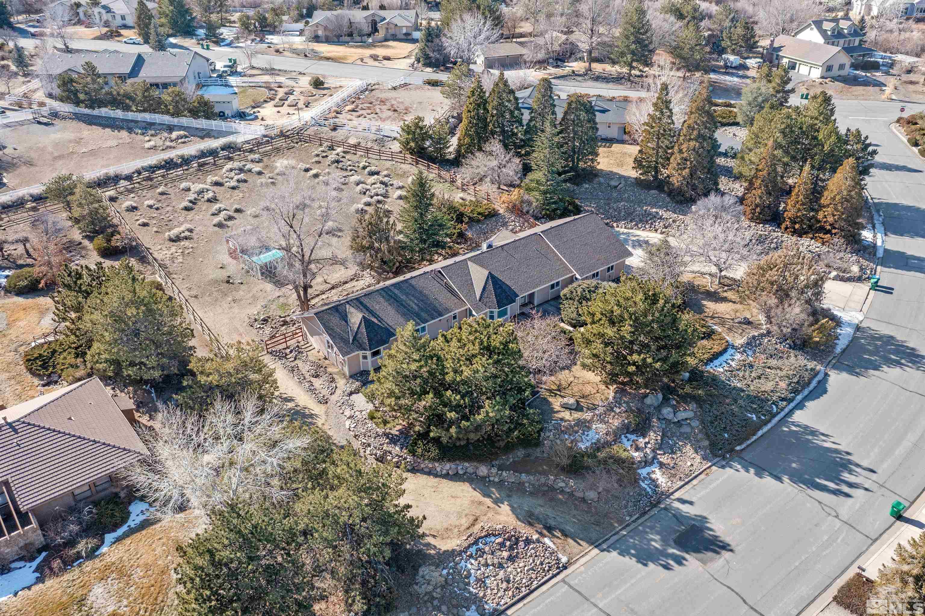 1200 Lampe Road Reno, NV 89511 - Photo 1 of 34 an aerial view of a house with a yard