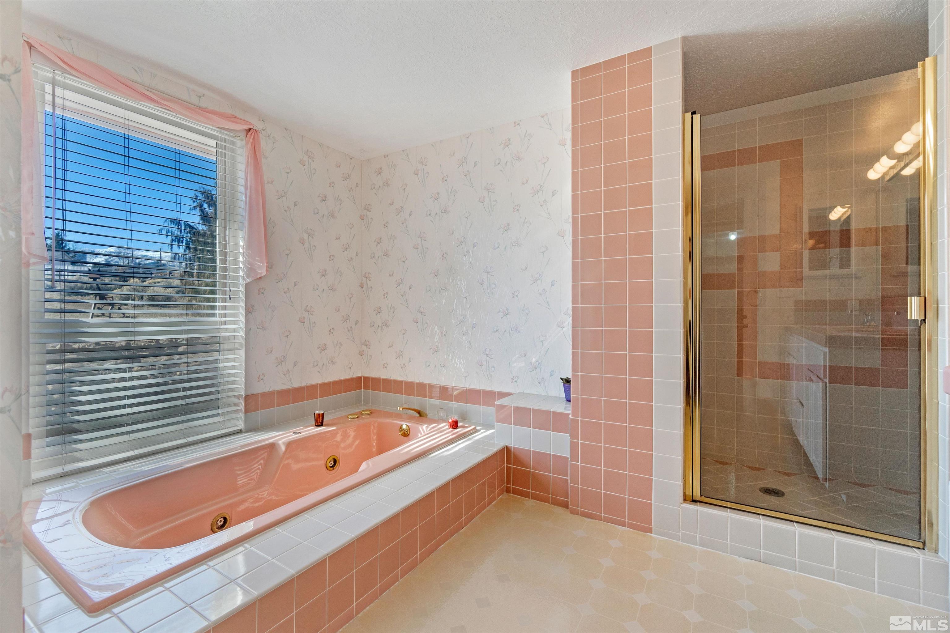 1200 Lampe Road Reno, NV 89511 - Photo 26 of 34 a bathroom with a tub a sink and shower