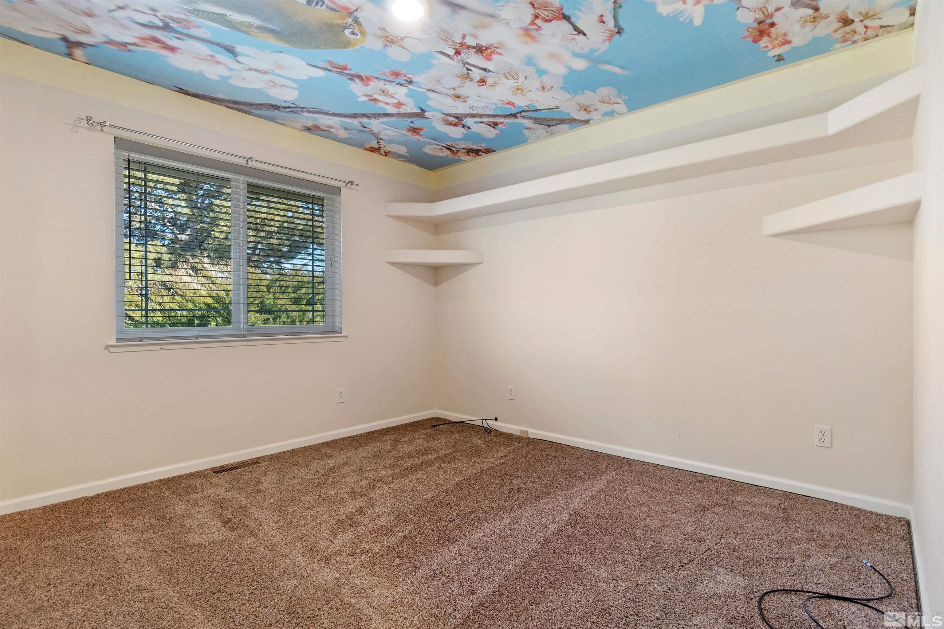 1200 Lampe Road Reno, NV 89511 - Photo 29 of 34 an empty room with a window