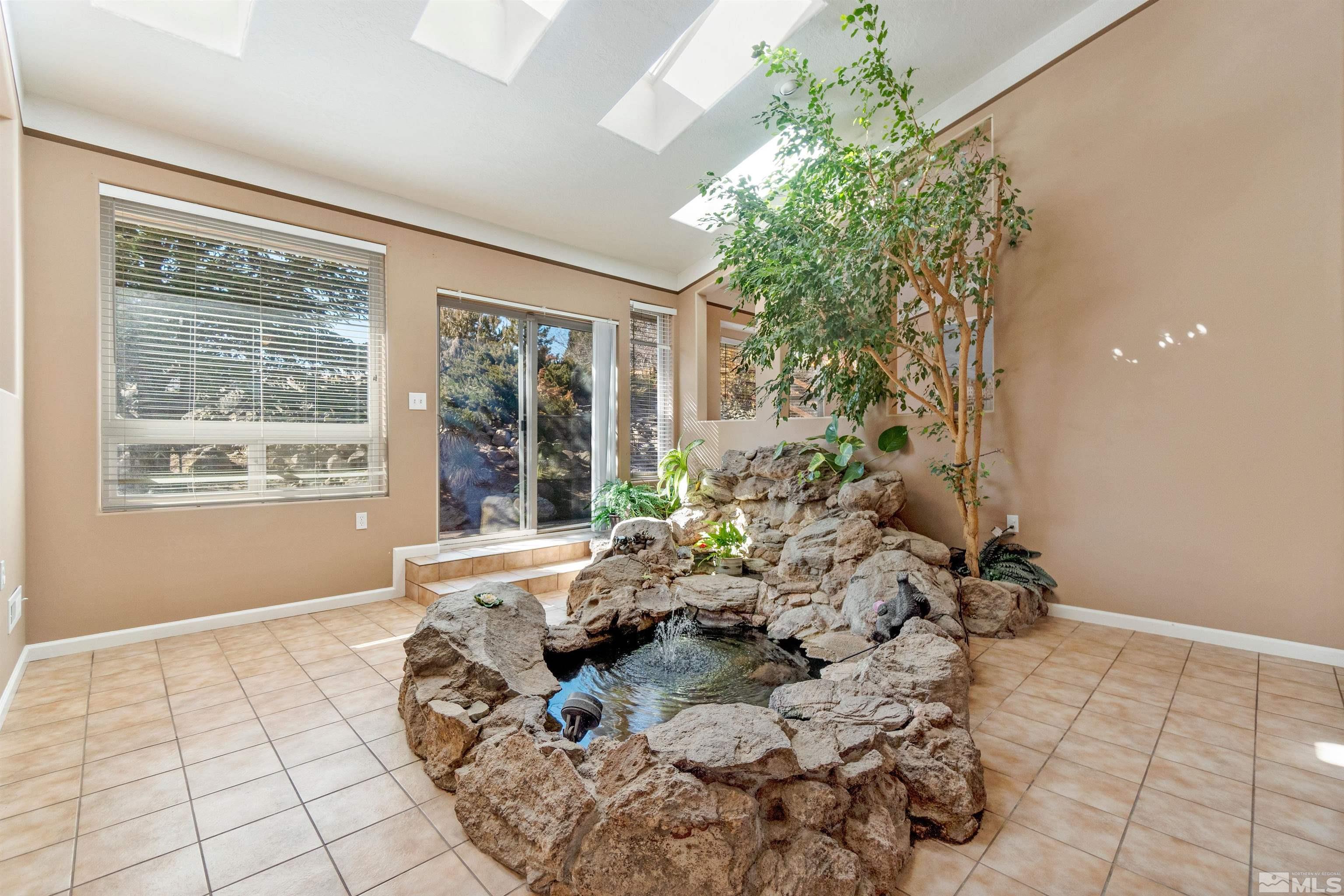 1200 Lampe Road Reno, NV 89511 - Photo 9 of 34 a living room with a large window