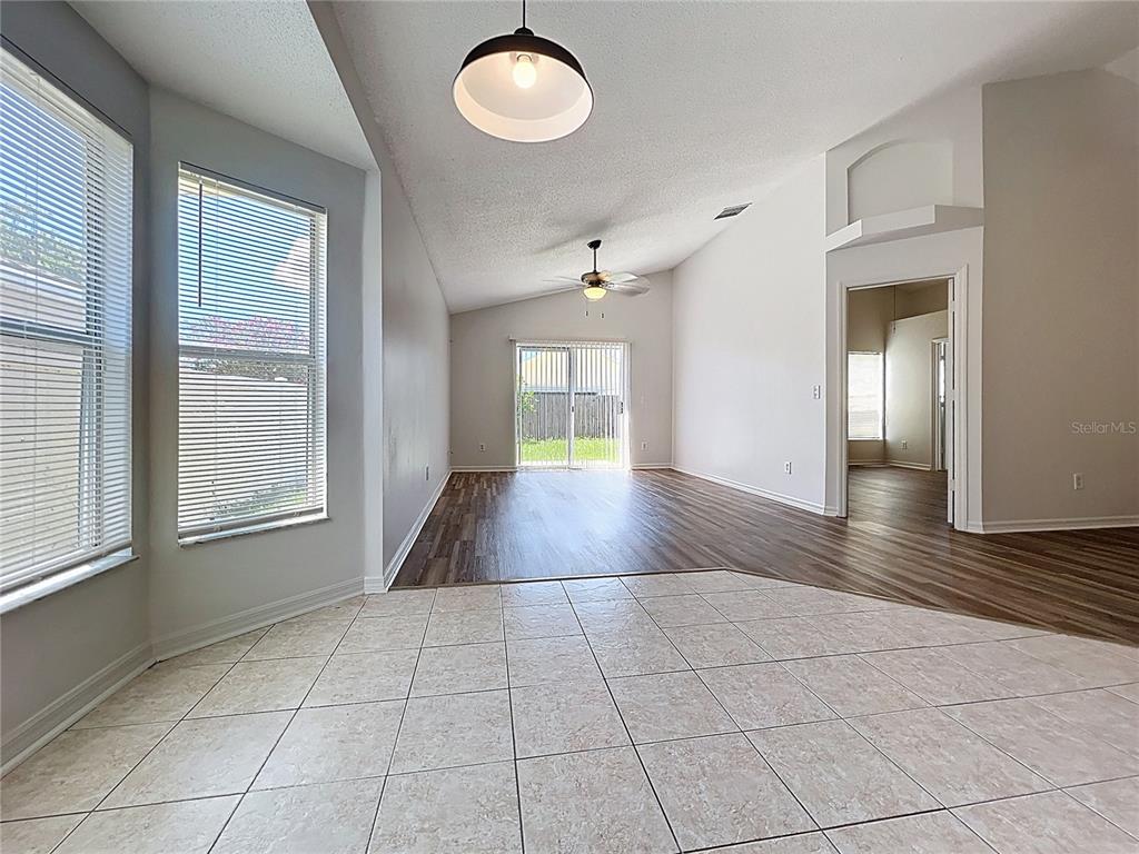 137 Piano Lane Davenport, FL 33896 - Photo 5 of 13 a view of an empty room and window