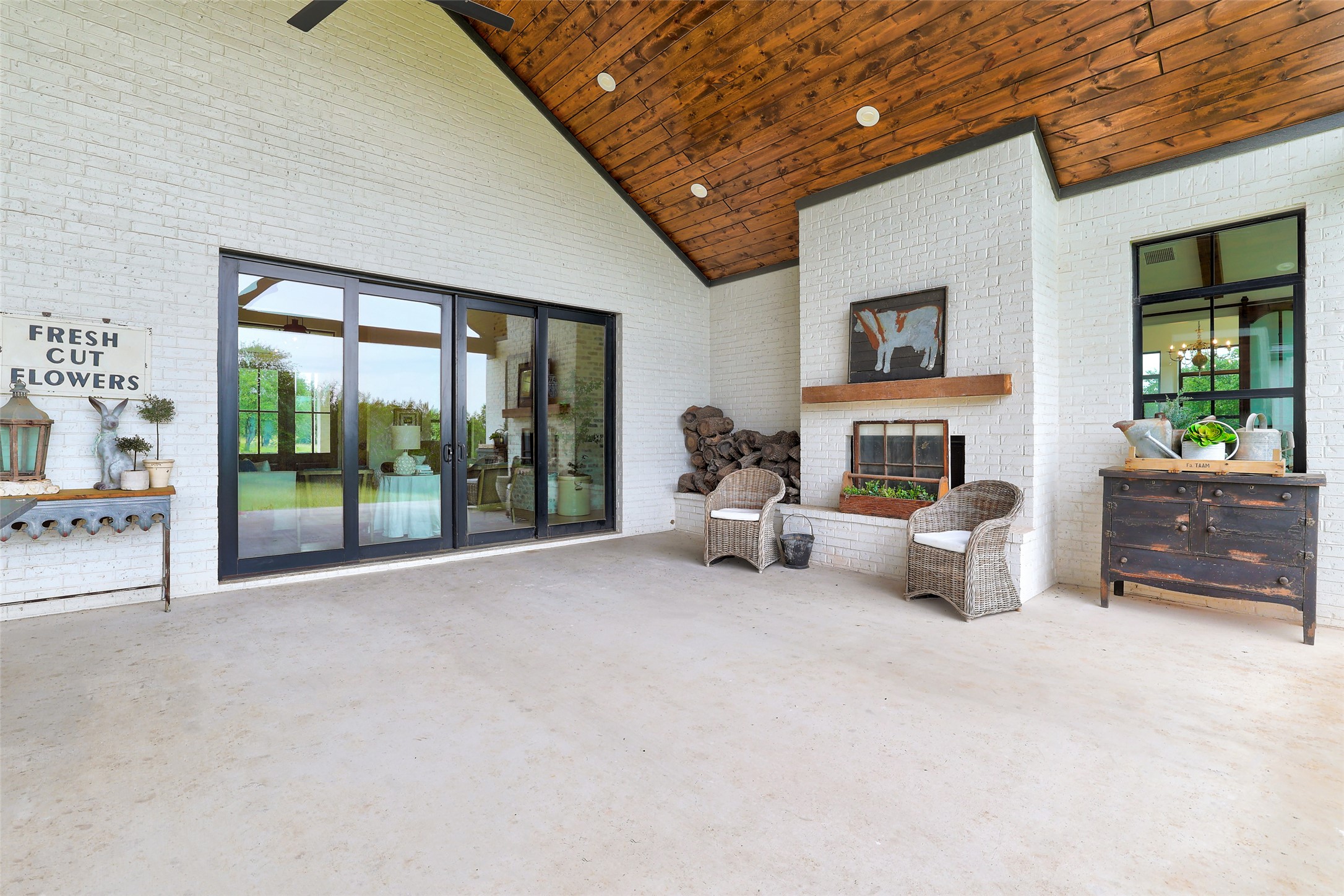 7670 Shiny Top Ranch Lane Salado, TX 76571 - Photo 31 of 40 a living room with furniture and a fireplace