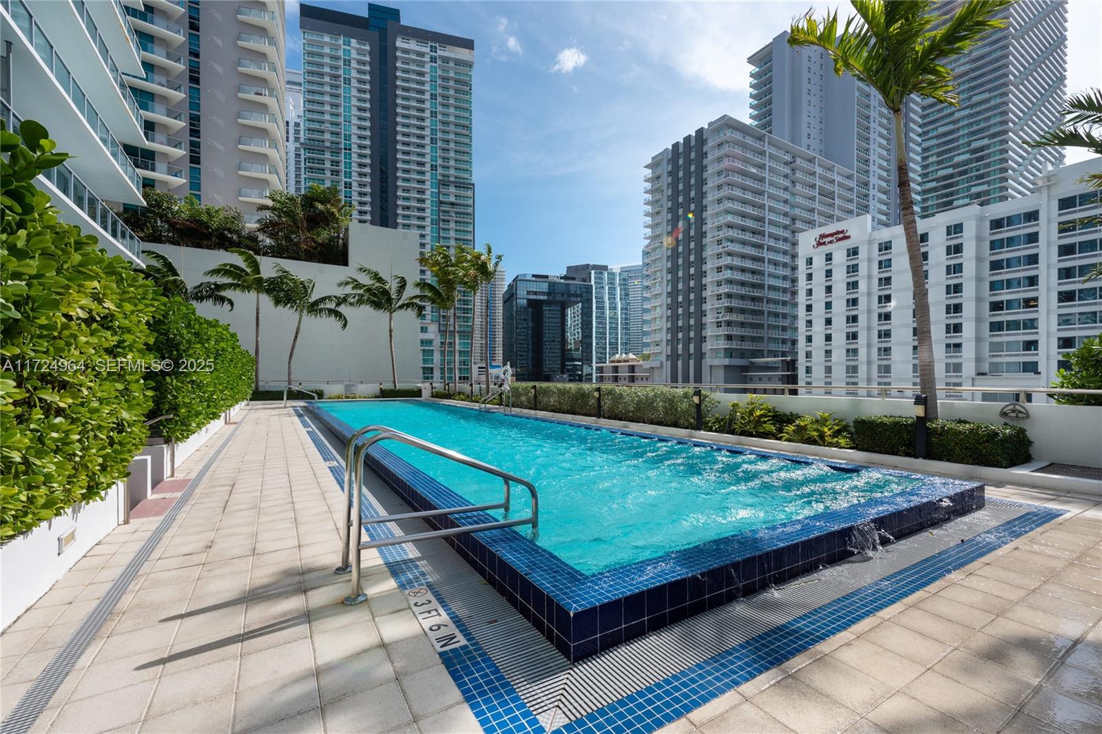 79 Southwest 12th Street, Unit 1107S Miami, FL 33130 - Photo 19 of 26 a view of a pool with a yard