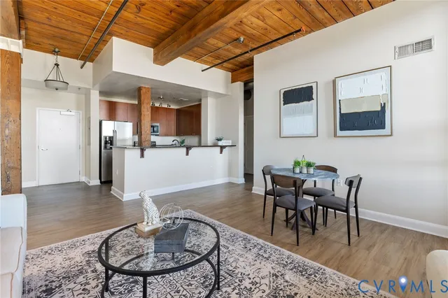 a view of a dining room with furniture