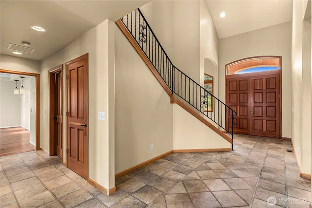 a view of a hallway with entryway