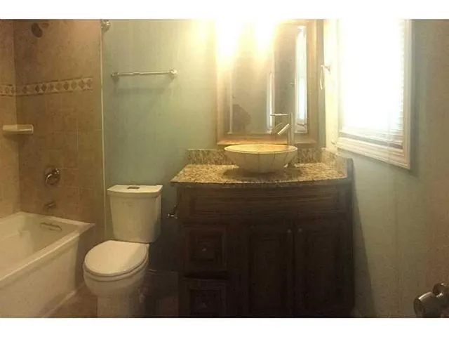 a view of a room with a white door