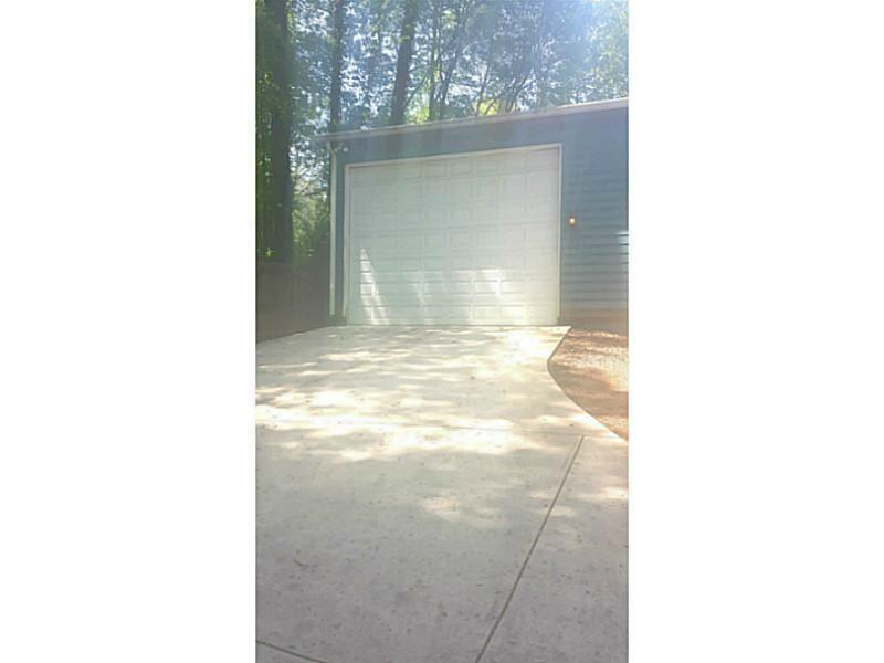 2076 Panola Road Lithonia, GA 30058 - Photo 14 of 16 a view of a room with a white door