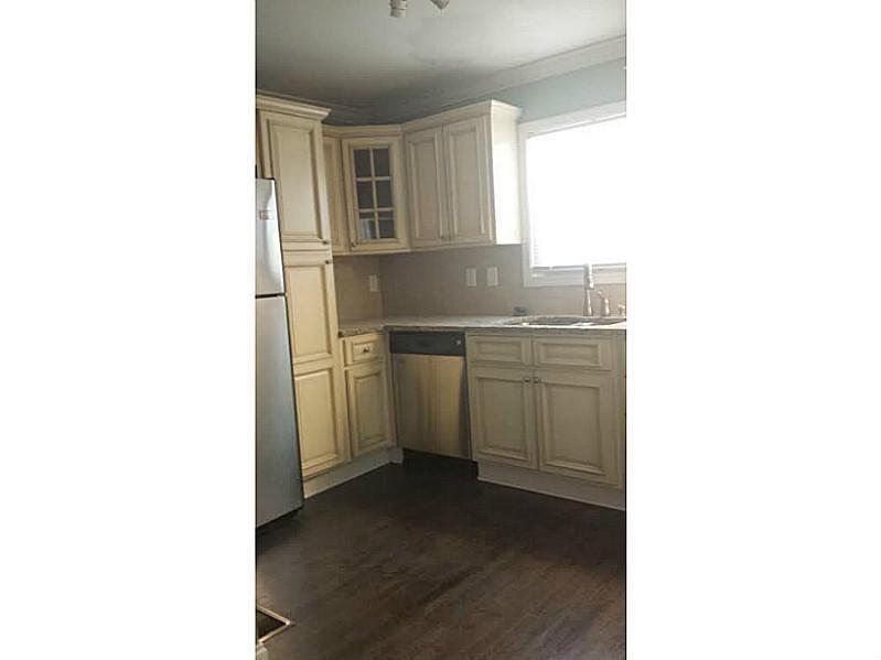 2076 Panola Road Lithonia, GA 30058 - Photo 10 of 16 a kitchen with a sink and cabinets