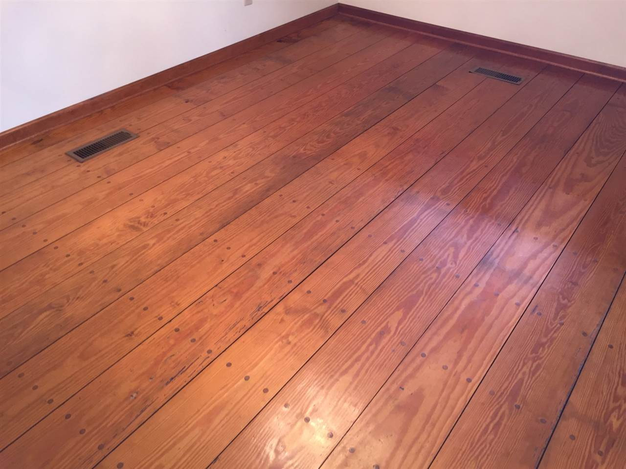 2693 Benson Hardee Road Benson, NC 27504 - Photo 16 of 25 Take a look at these hardwoods! They were hand cut and laid, custom for this home. Hardwood floors
