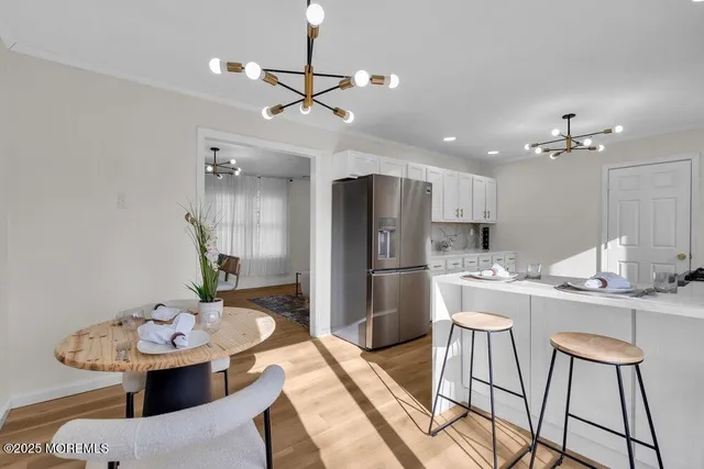 a kitchen with a stove and a microwave