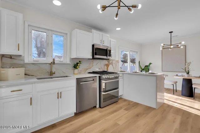 a bathroom with a sink toilet and vanity