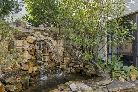 a backyard of a house with lots of green space
