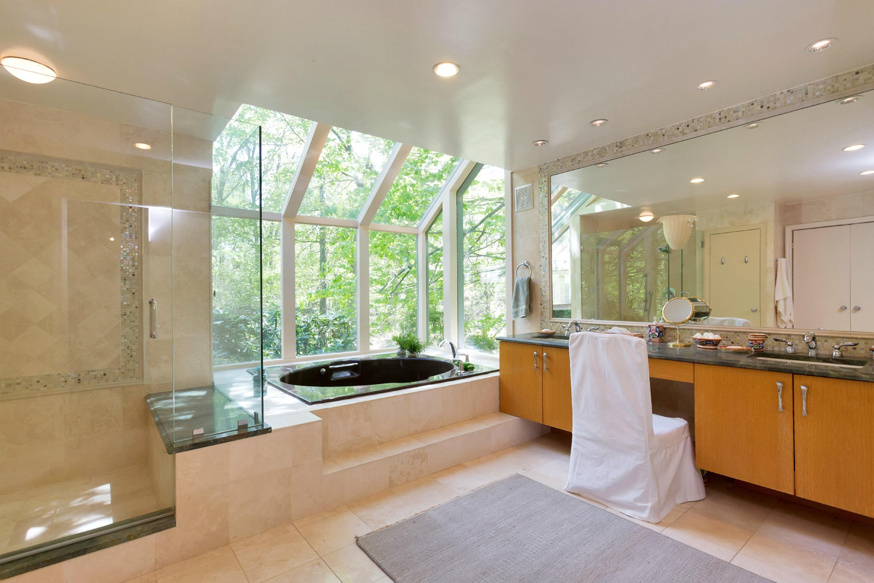 67 Sumner Road Greenwich, CT 06831 - Photo 12 of 25 a large kitchen with a large window and counter top