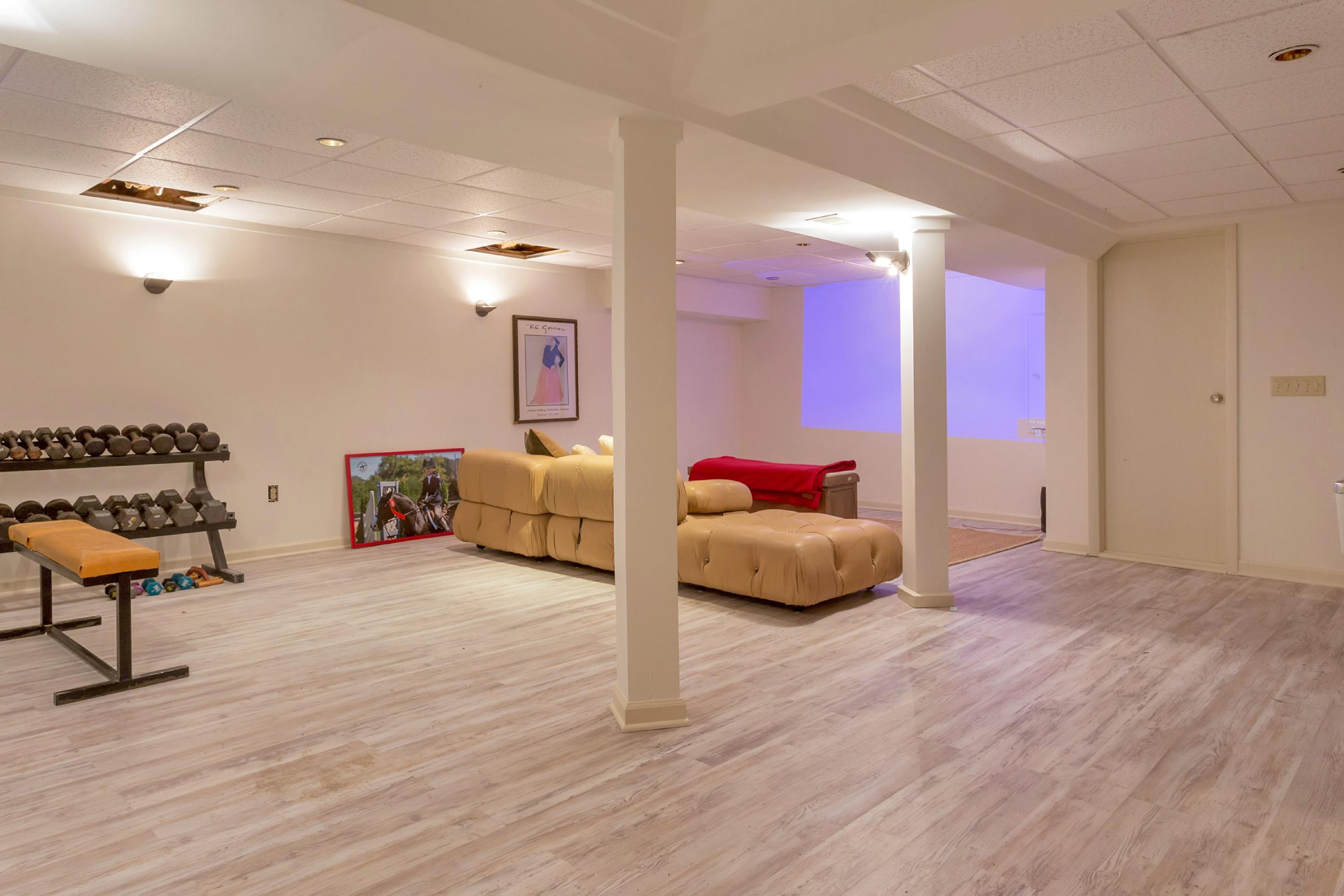 67 Sumner Road Greenwich, CT 06831 - Photo 17 of 25 a bedroom with furniture and a wooden floor