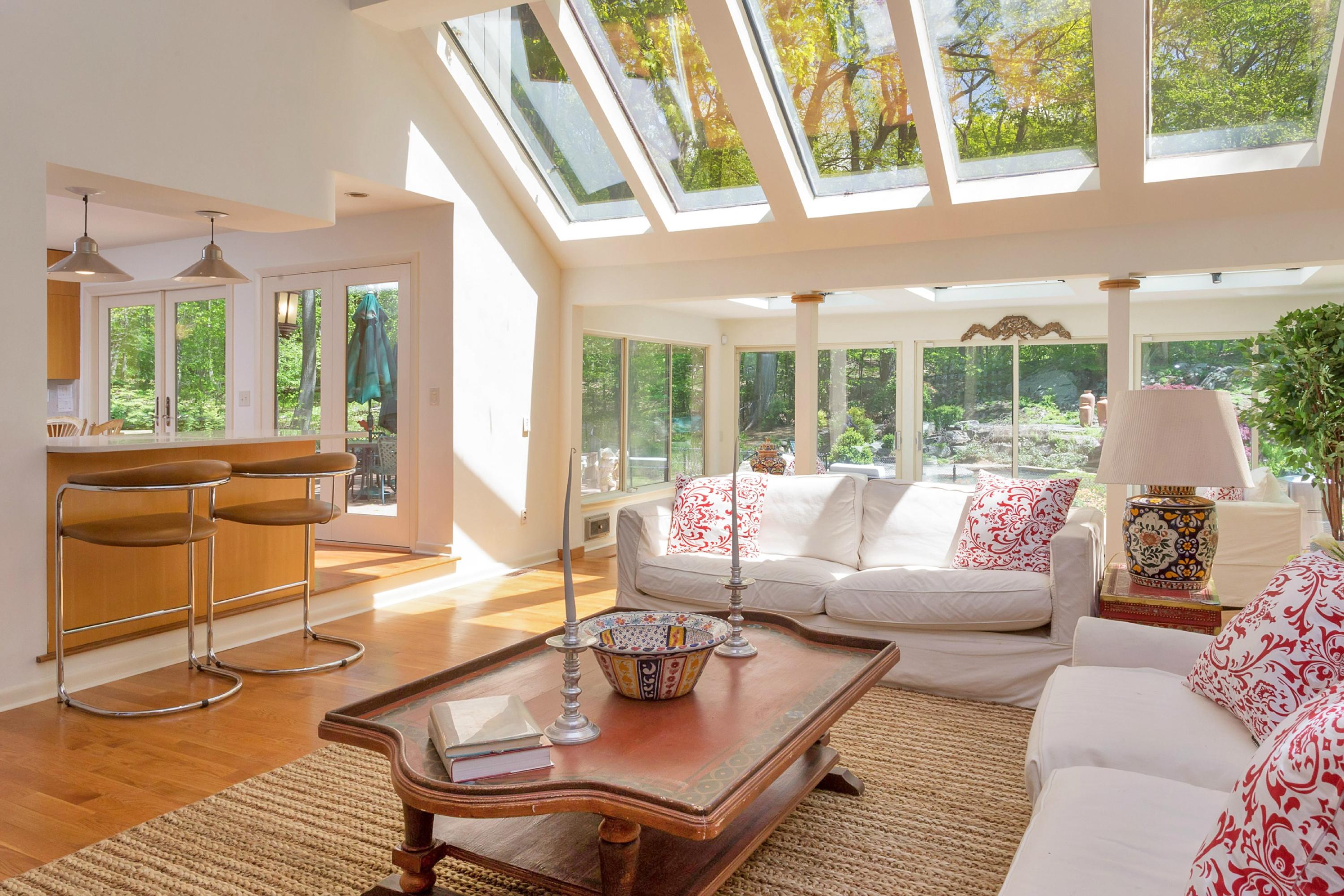 67 Sumner Road Greenwich, CT 06831 - Photo 5 of 25 a living room with furniture and a large window