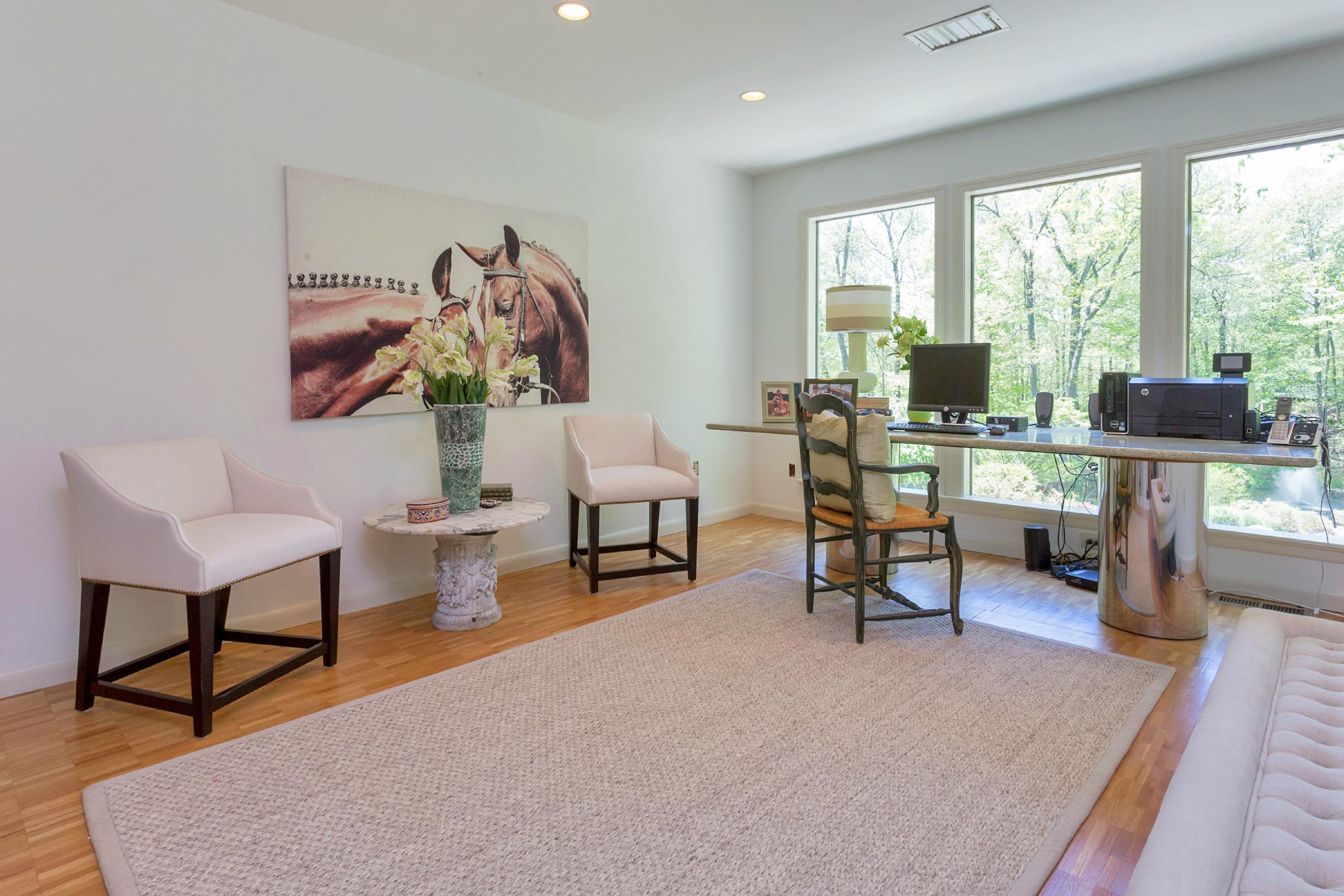 67 Sumner Road Greenwich, CT 06831 - Photo 10 of 25 a living room with furniture and a painting of the floor