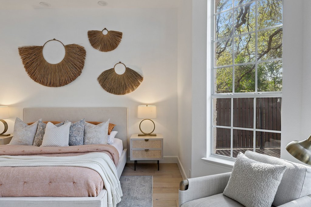 1815 Rue De St Tropez Austin, TX 78746 - Photo 4 of 39 Bedroom featuring wood finished floors and baseboards