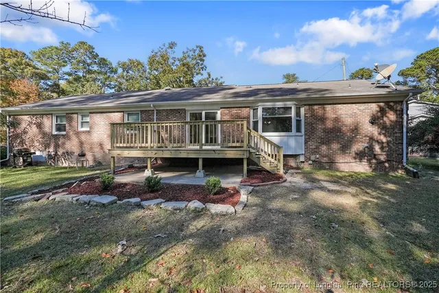 front view of a house with a big yard