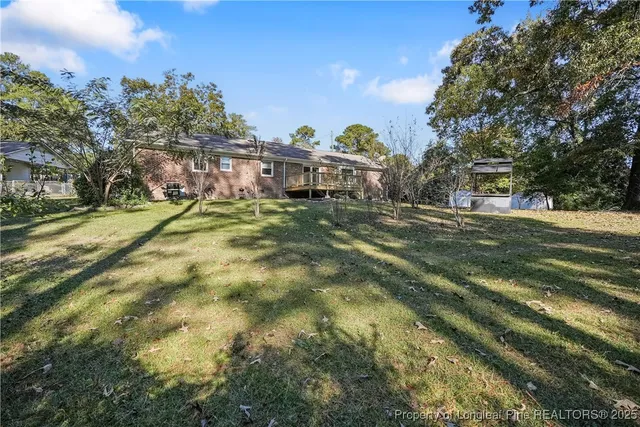 a view of a yard in front of the house