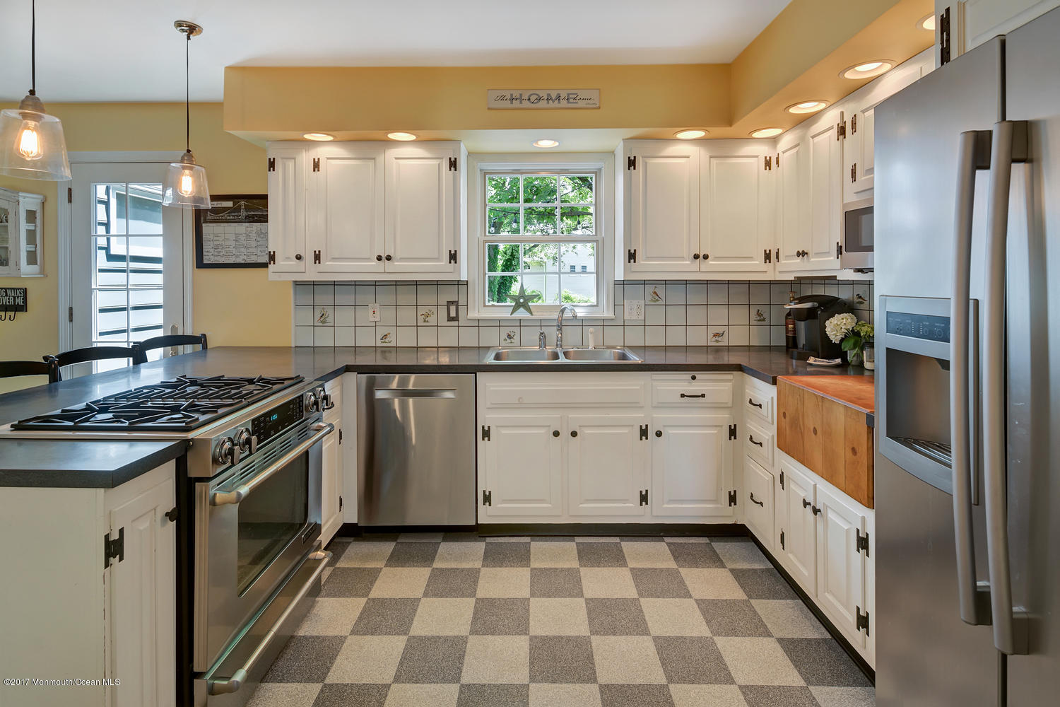 84 Rustic Terrace Little Silver, NJ 07739 - Photo 4 of 20 a kitchen with a stove a sink and a refrigerator