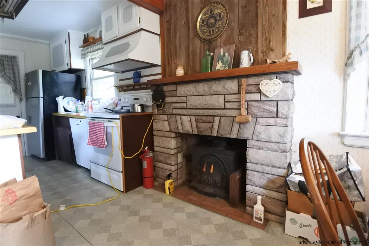 284 Bush Road Stone Ridge, NY 12484 - Photo 12 of 34 a view of a room with shelves