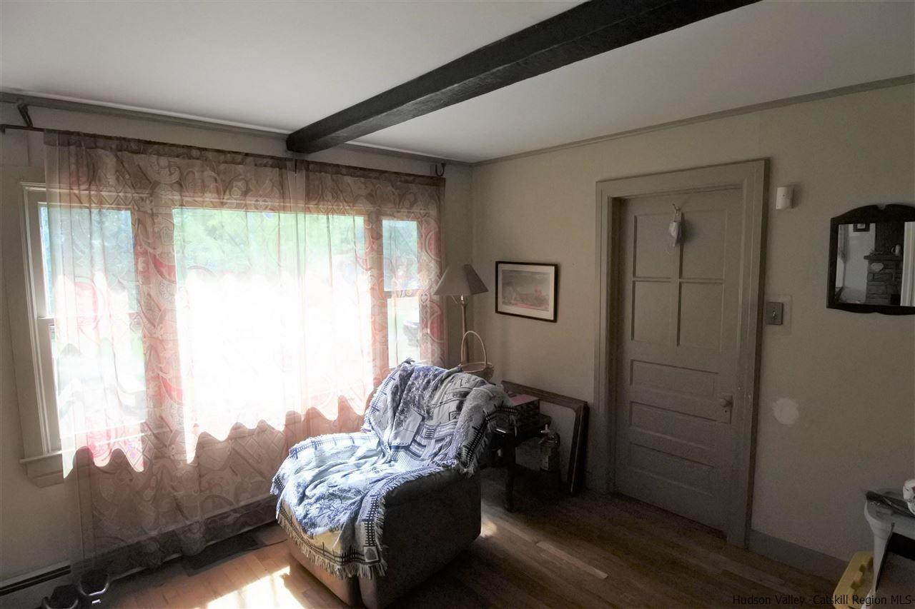 284 Bush Road Stone Ridge, NY 12484 - Photo 13 of 34 a bedroom with bed and a window