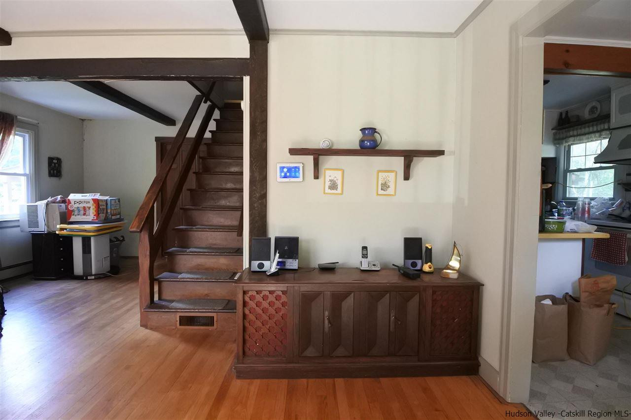 284 Bush Road Stone Ridge, NY 12484 - Photo 17 of 34 a living room with furniture and wooden floor