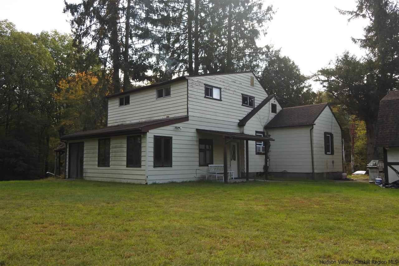 284 Bush Road Stone Ridge, NY 12484 - Photo 5 of 34 a view of a house with a garden