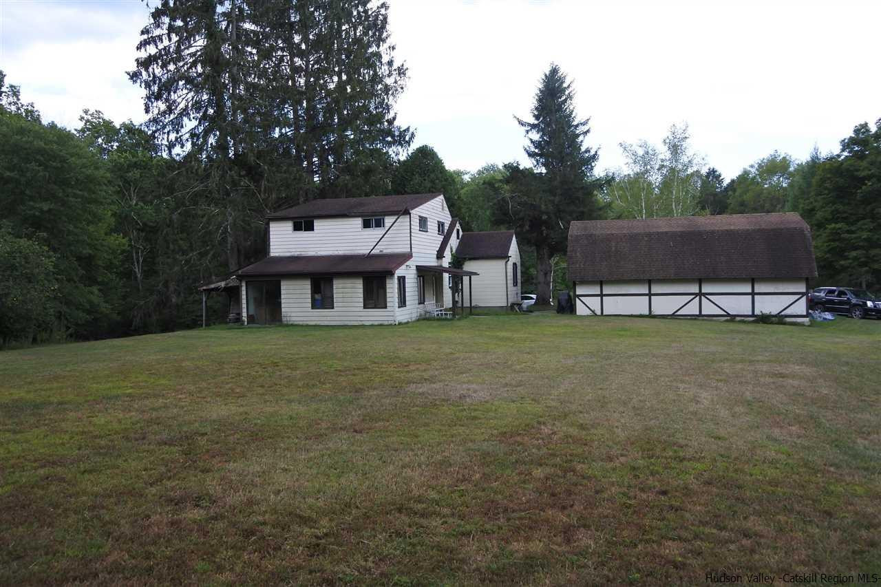 284 Bush Road Stone Ridge, NY 12484 - Photo 6 of 34 a view of a house with a big yard