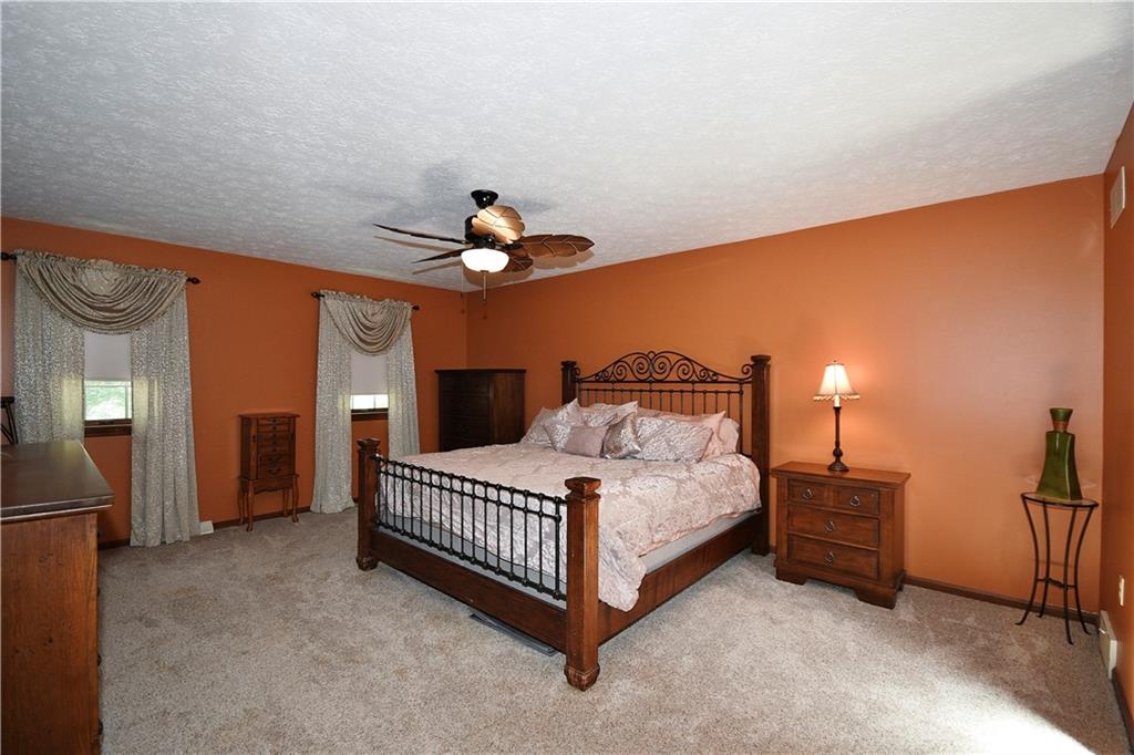 159 Klinger Road Canonsburg, PA 15317 - Photo 11 of 19 a bedroom with a bed and a chandelier