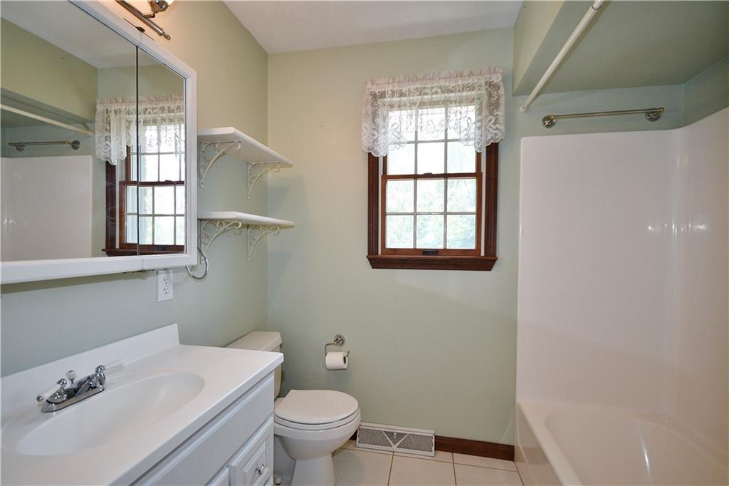 159 Klinger Road Canonsburg, PA 15317 - Photo 17 of 19 a bathroom with a sink toilet and window
