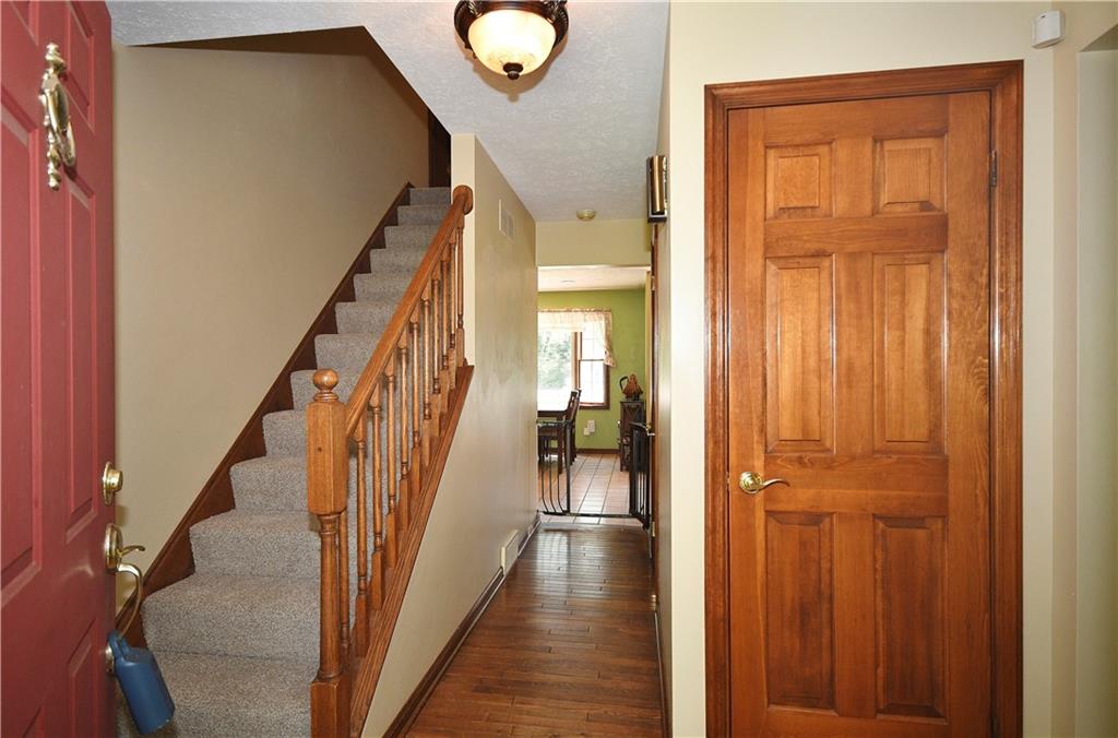 159 Klinger Road Canonsburg, PA 15317 - Photo 5 of 19 a view of a hallway with wooden floor and staircase